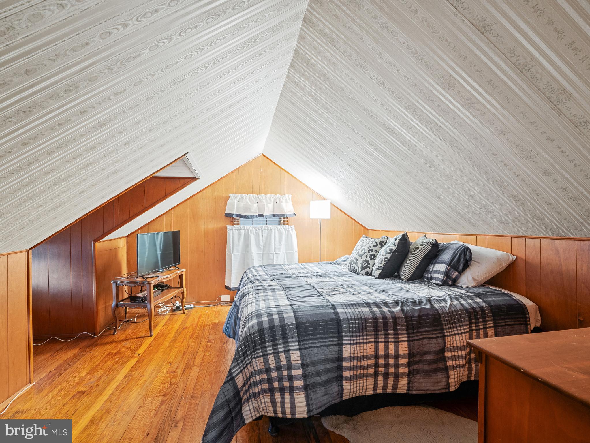 102 Queen Anne Road Glen Burnie, MD 21060 - Photo 18 of 26 a bedroom with a bed and wooden floor