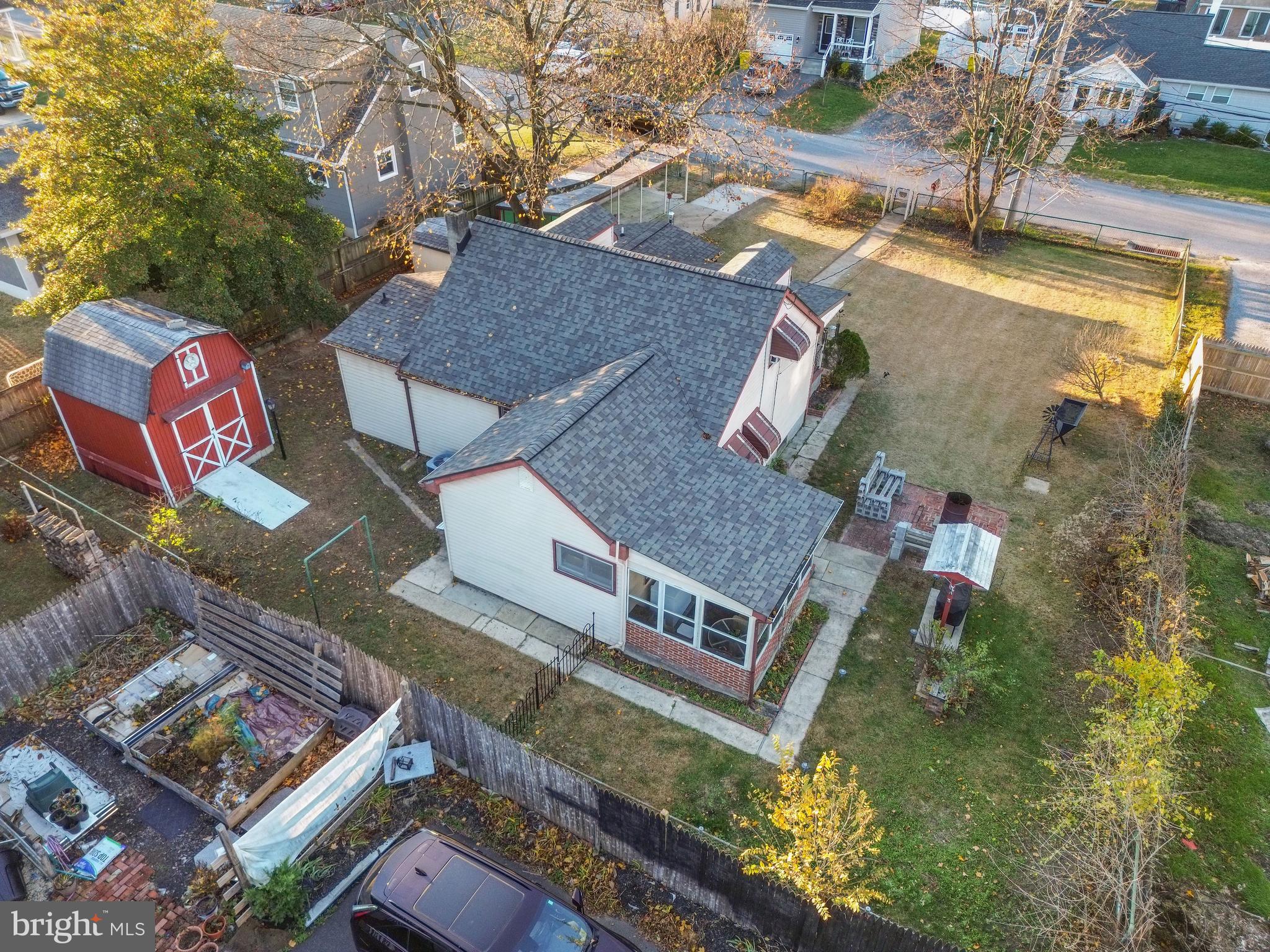 102 Queen Anne Road Glen Burnie, MD 21060 - Photo 23 of 26 an aerial view of residential houses with outdoor space