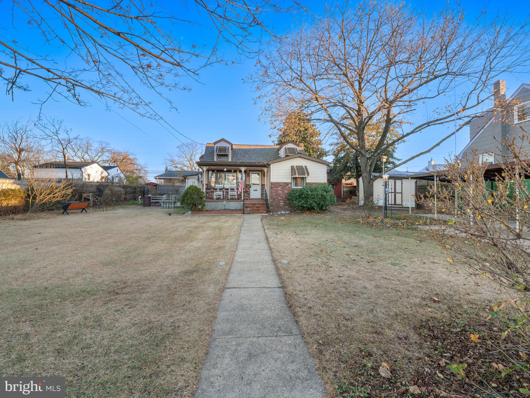 102 Queen Anne Road Glen Burnie, MD 21060 - Photo 26 of 26 a view of a house with a street