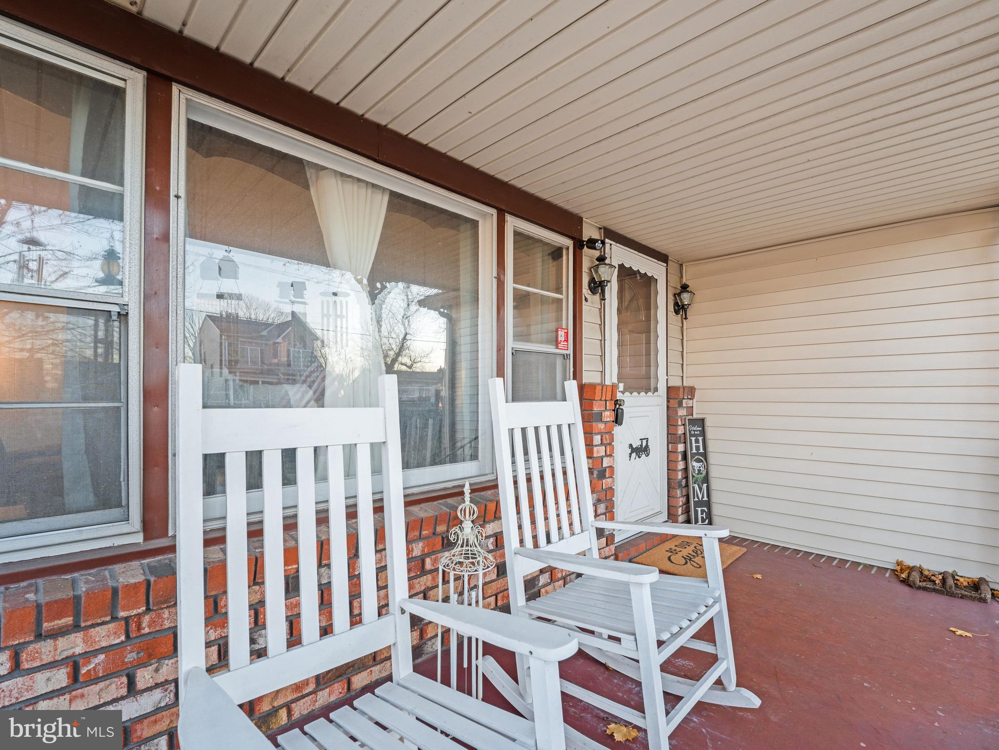 102 Queen Anne Road Glen Burnie, MD 21060 - Photo 4 of 26 a balcony with furniture and rug