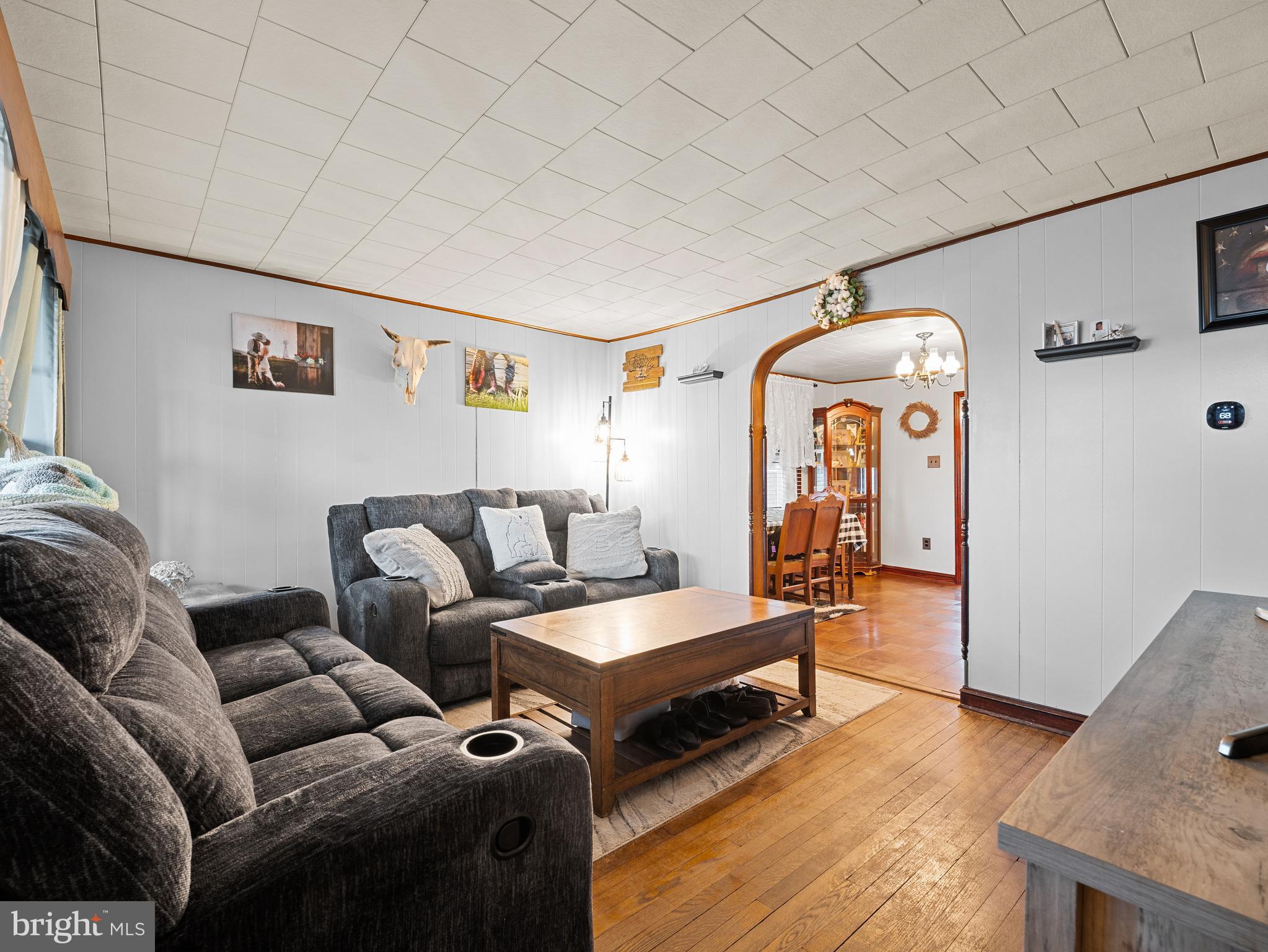 102 Queen Anne Road Glen Burnie, MD 21060 - Photo 5 of 26 a living room with furniture and wooden floor