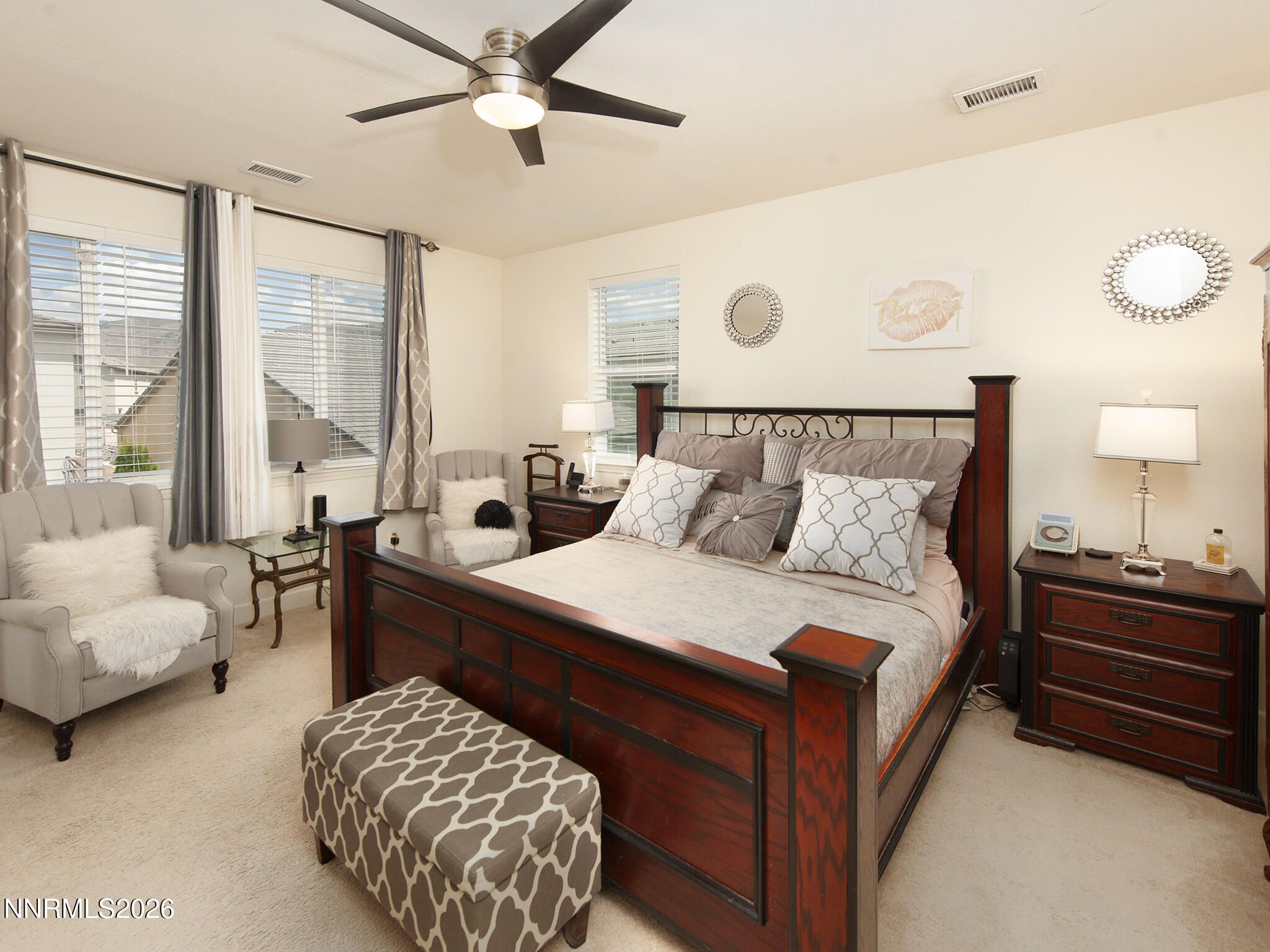 9766 Pachuca Drive Reno, NV 89521 - Photo 23 of 59 a bedroom with a bed and a couch
