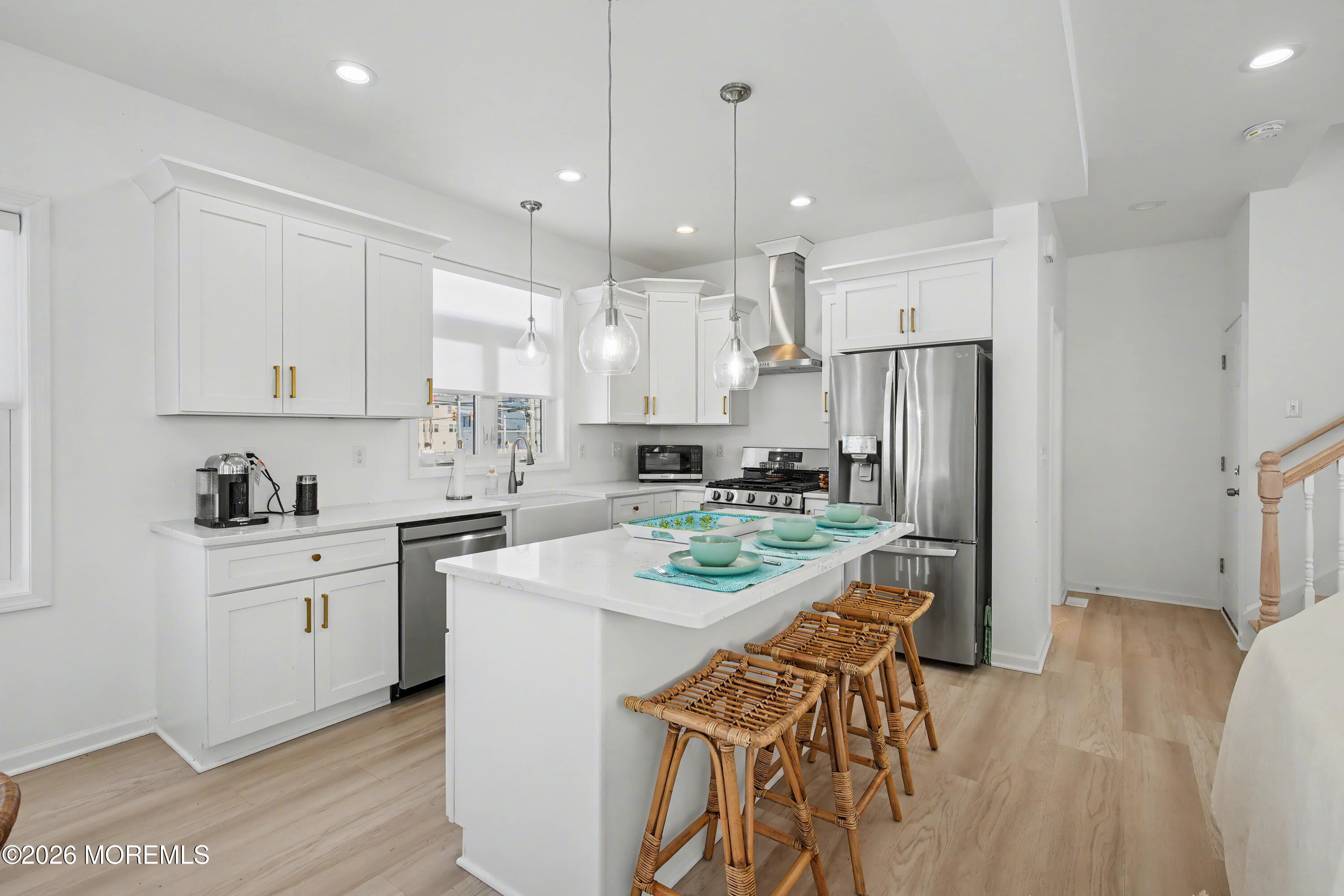 155 West Atlantic Way Lavallette, NJ 08735 - Photo 18 of 53 a kitchen with stainless steel appliances white cabinets a sink a stove a refrigerator and island