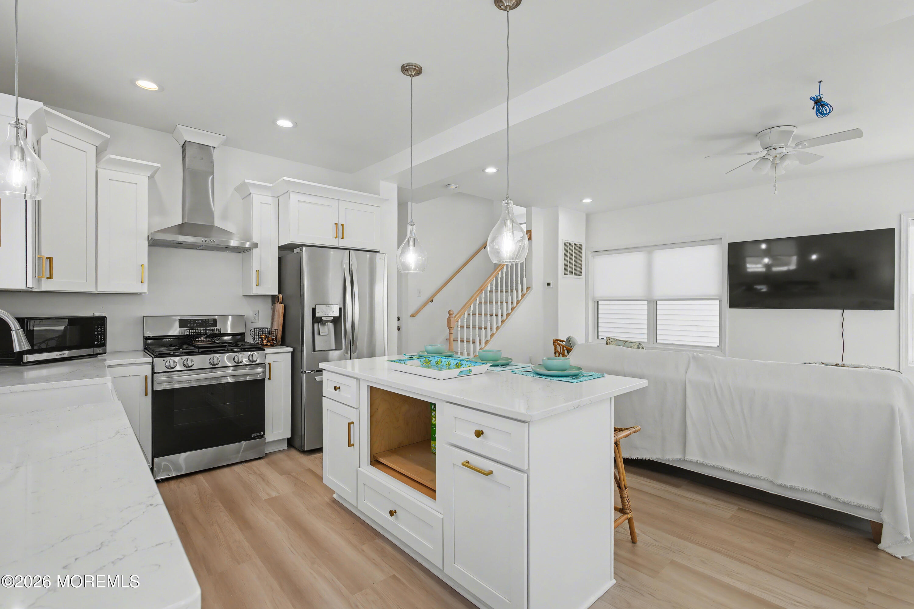 155 West Atlantic Way Lavallette, NJ 08735 - Photo 20 of 53 a kitchen with stainless steel appliances granite countertop a stove and a refrigerator