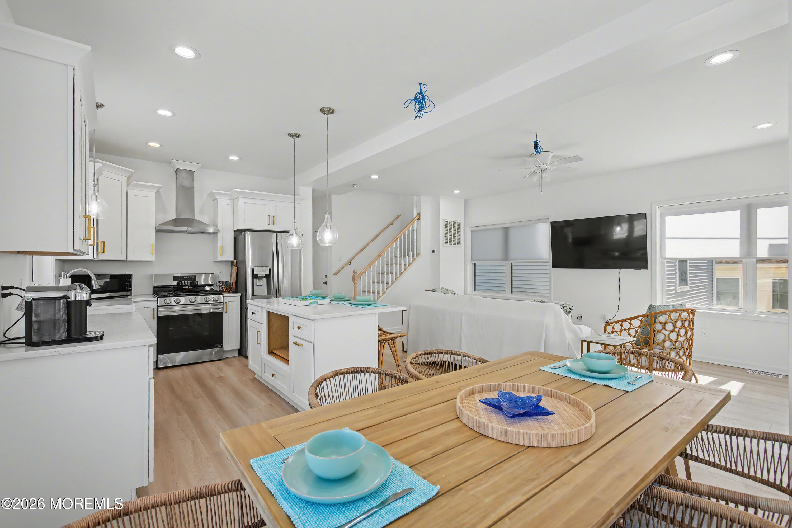 155 West Atlantic Way Lavallette, NJ 08735 - Photo 23 of 53 a living room with kitchen island furniture and a flat screen tv