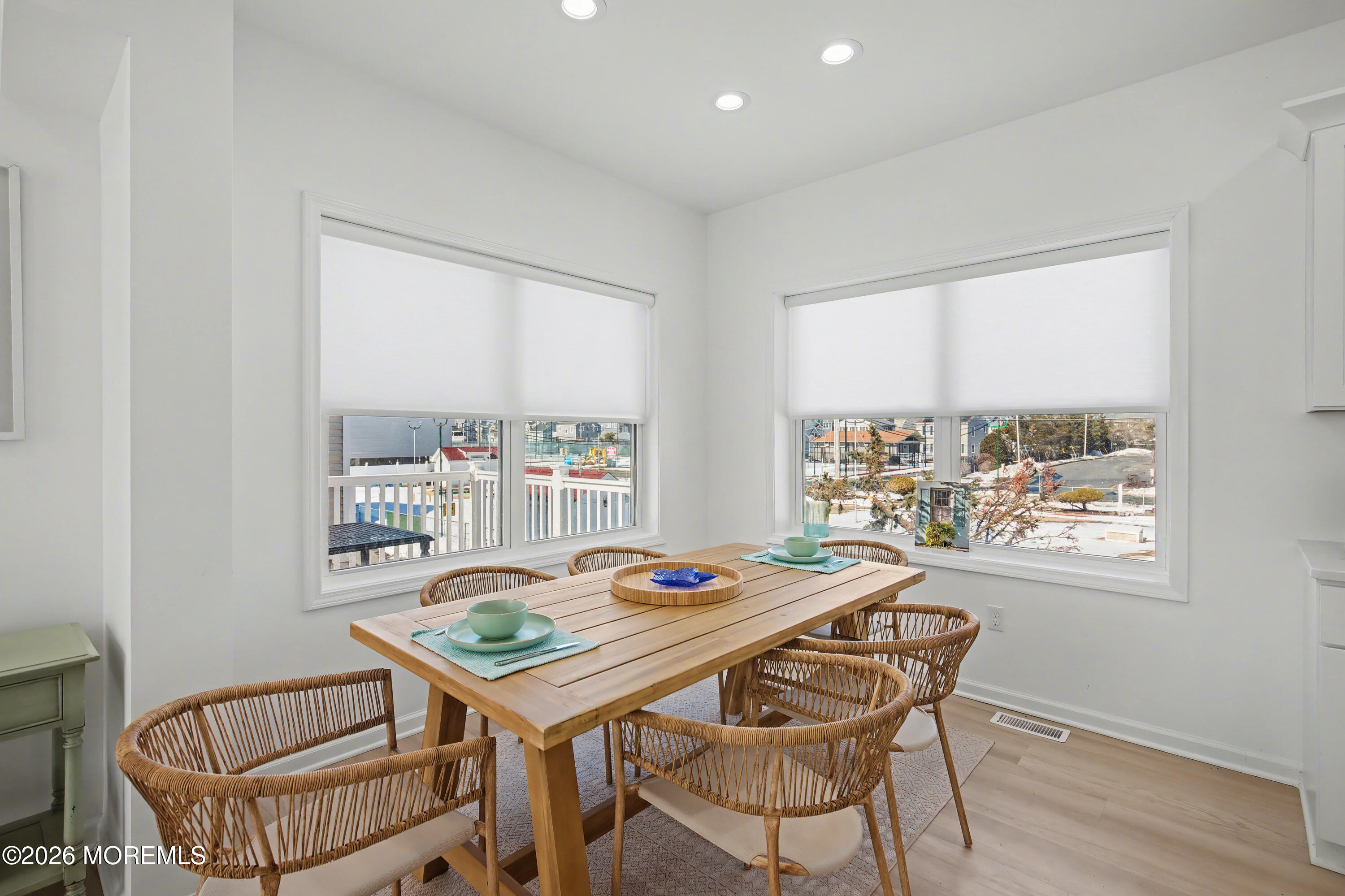 155 West Atlantic Way Lavallette, NJ 08735 - Photo 24 of 53 a table and chairs in a room