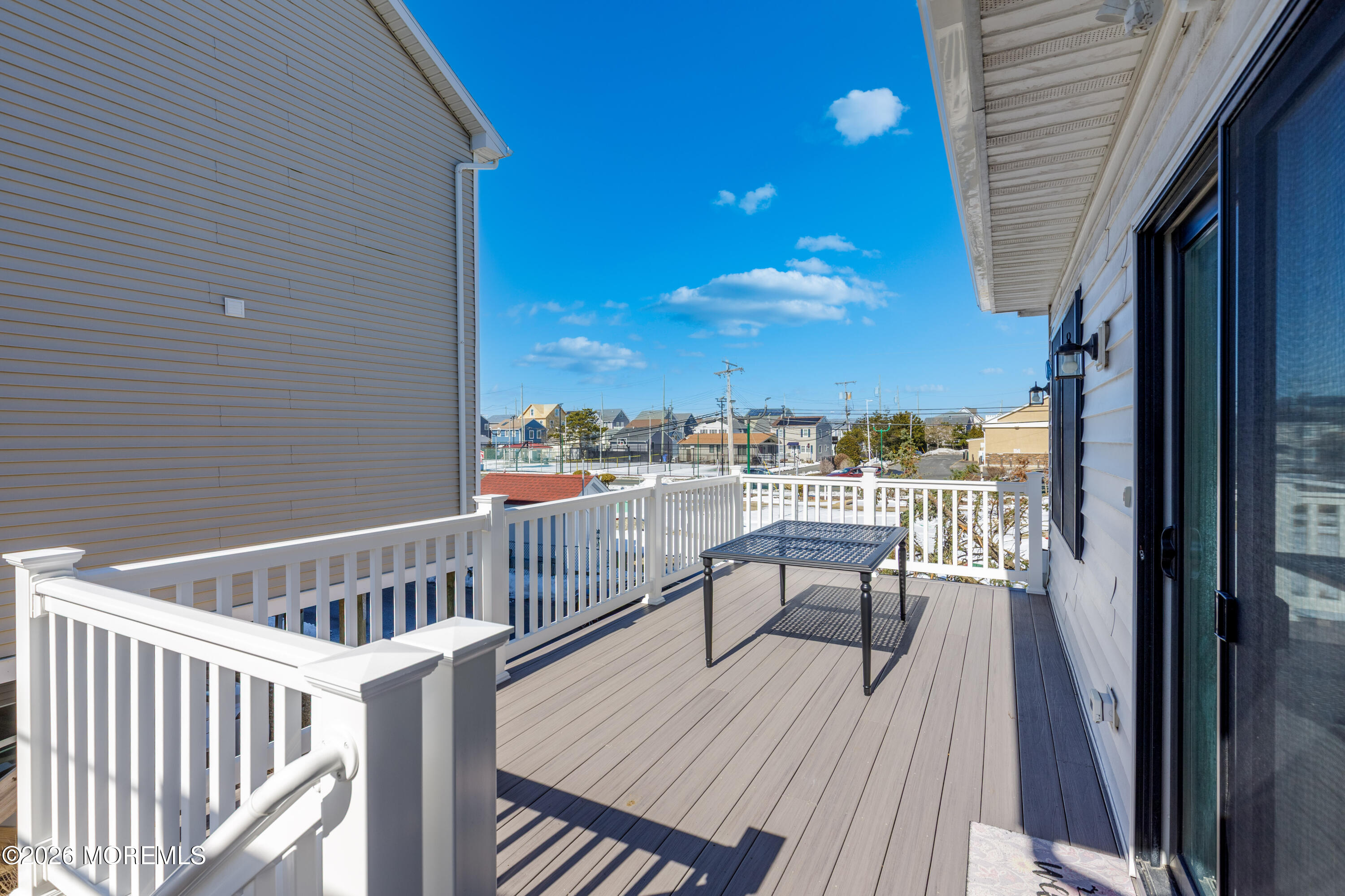 155 West Atlantic Way Lavallette, NJ 08735 - Photo 25 of 53 a view of a balcony with wooden floor