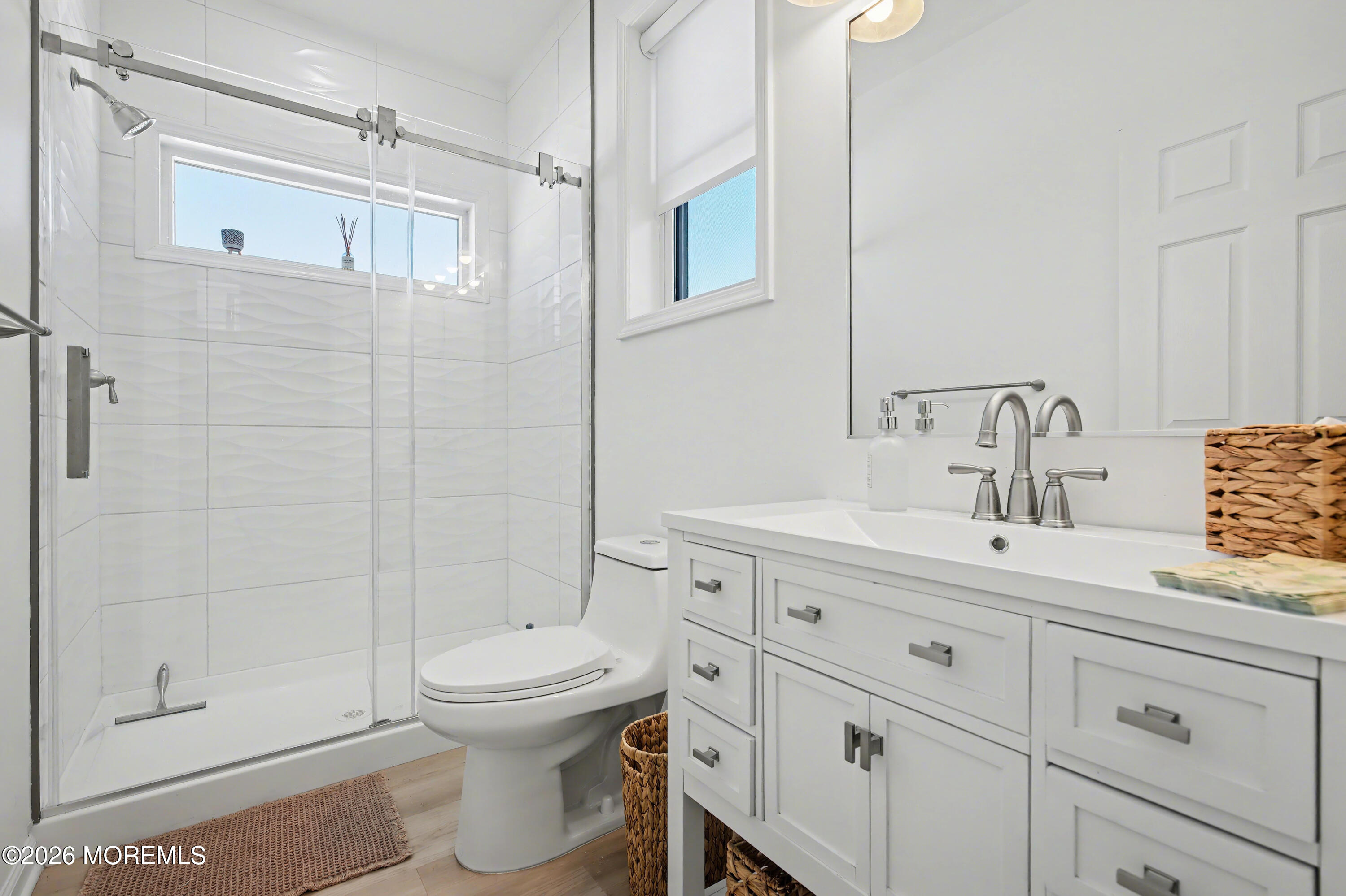155 West Atlantic Way Lavallette, NJ 08735 - Photo 29 of 53 a bathroom with a sink toilet and shower