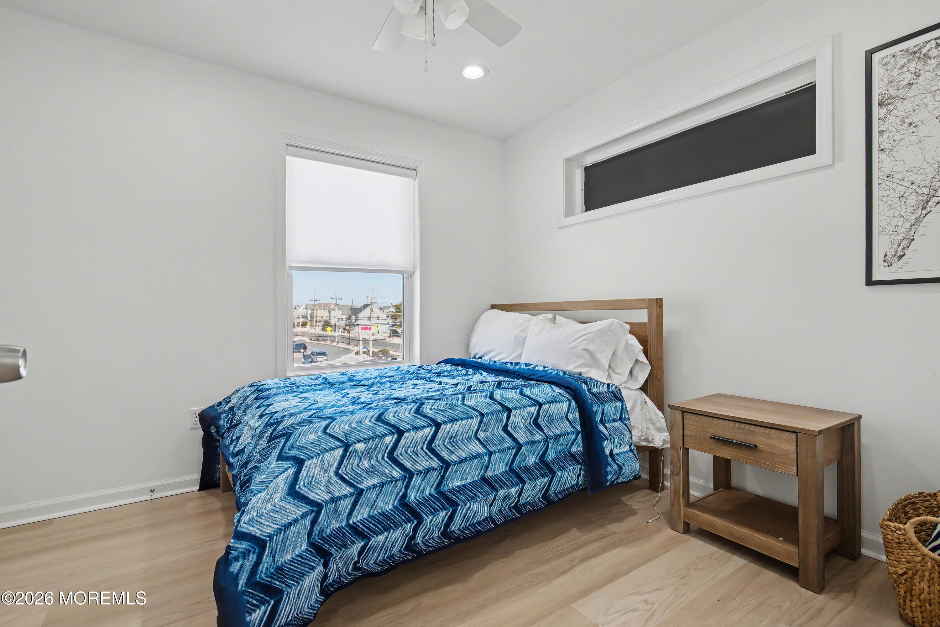 155 West Atlantic Way Lavallette, NJ 08735 - Photo 33 of 53 a bedroom with a bed and a tv