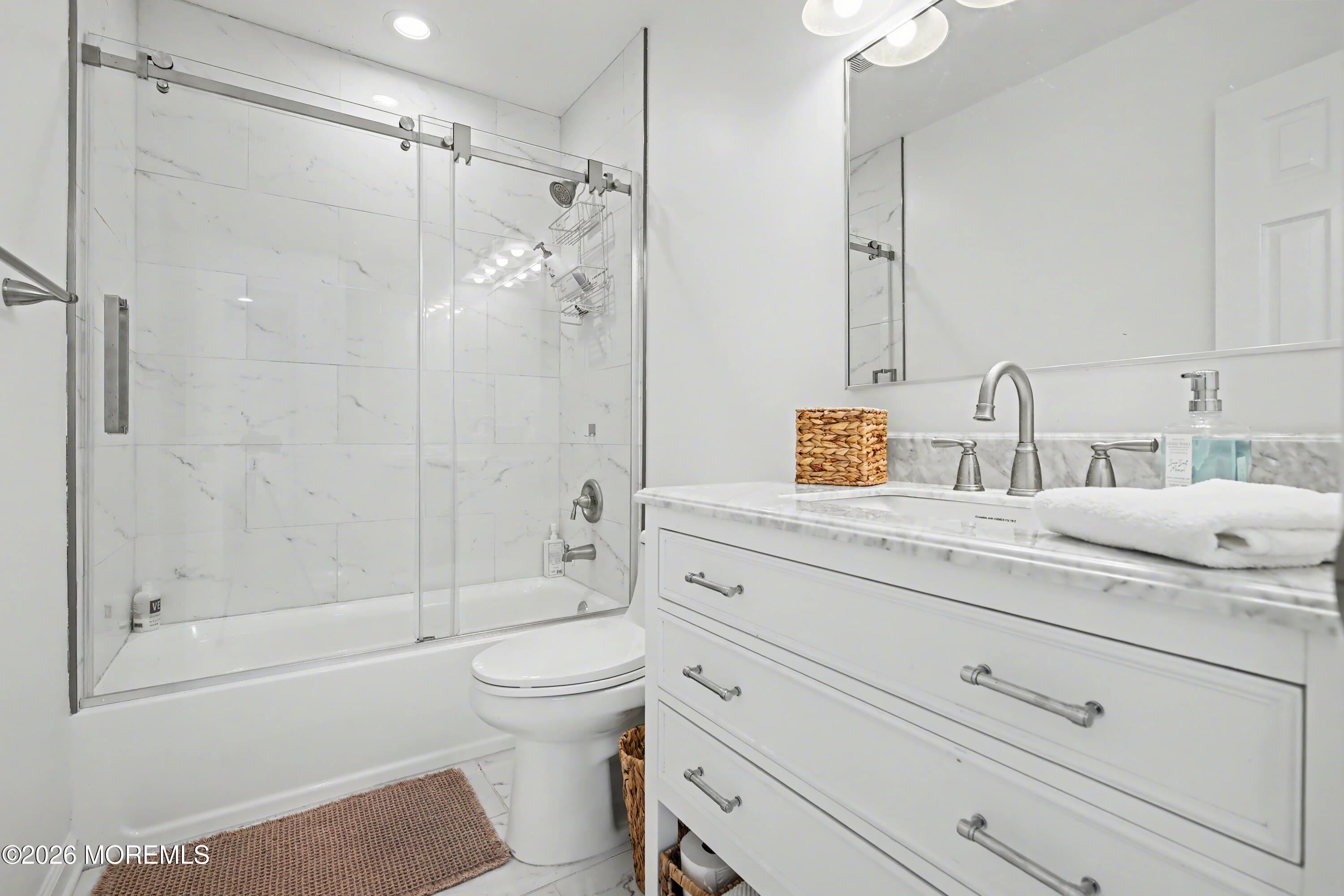 155 West Atlantic Way Lavallette, NJ 08735 - Photo 37 of 53 a bathroom with a shower sink vanity mirror and toilet