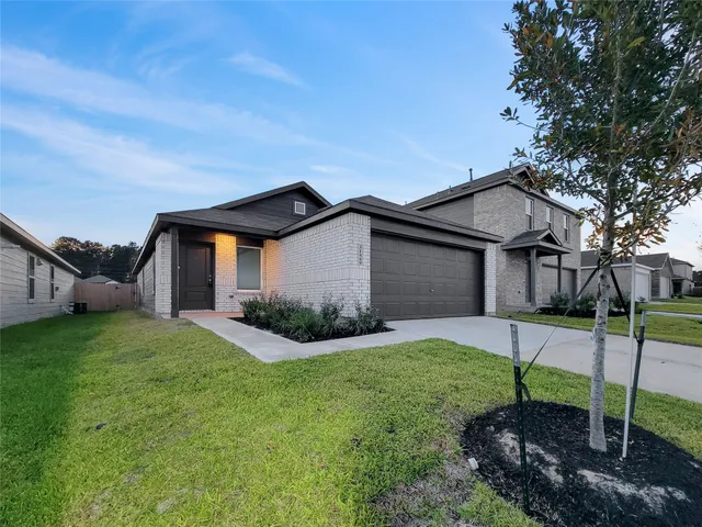 a house view with a garden space