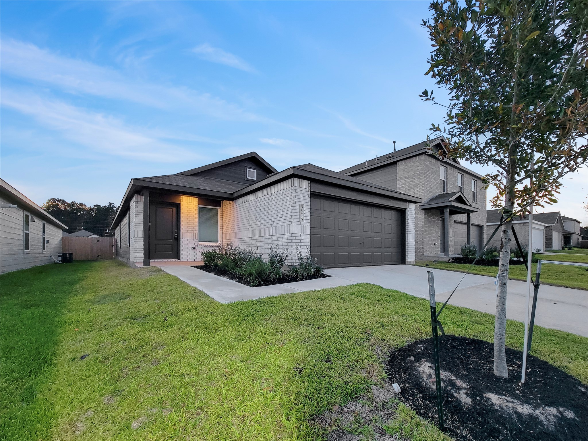 a house view with a garden space