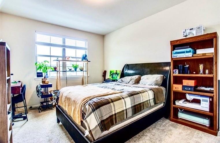 4215 Snow Goose Trail Arlington, TX 76005 - Photo 10 of 40 a bedroom with a bed and a window