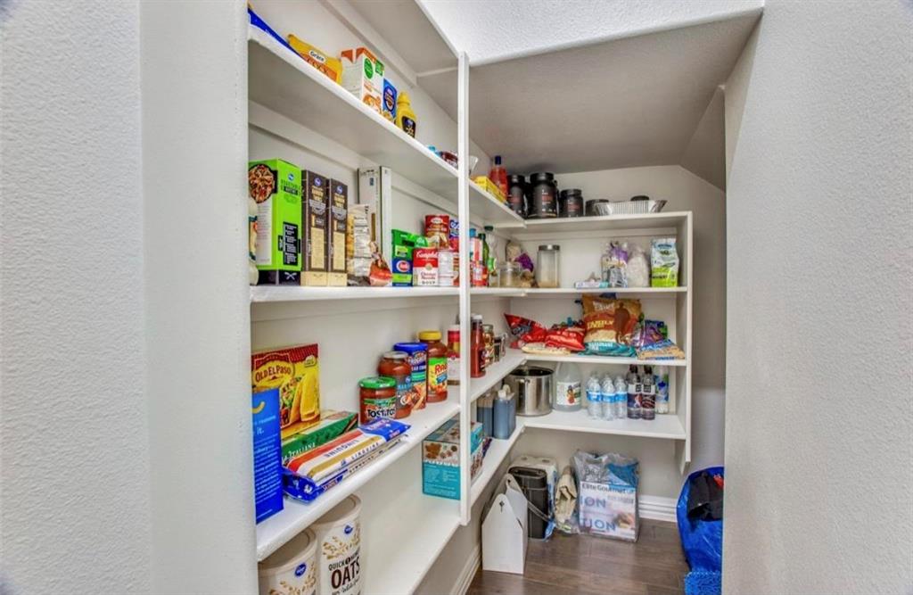 4215 Snow Goose Trail Arlington, TX 76005 - Photo 12 of 40 a storage room with a lot of stuff and toys