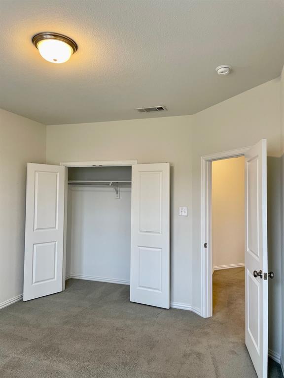 4215 Snow Goose Trail Arlington, TX 76005 - Photo 14 of 40 an empty room with closet area