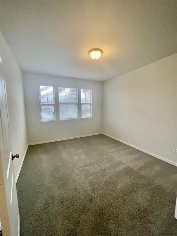 4215 Snow Goose Trail Arlington, TX 76005 - Photo 17 of 40 an empty room with a window