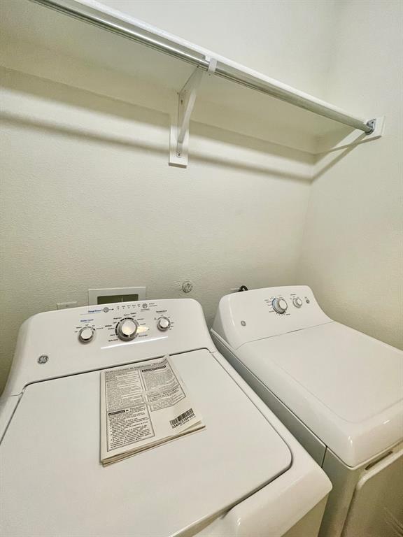 4215 Snow Goose Trail Arlington, TX 76005 - Photo 19 of 40 a utility room with dryer and washer