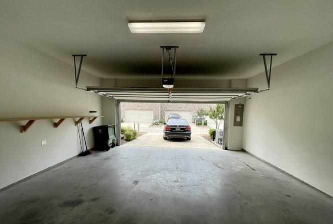 4215 Snow Goose Trail Arlington, TX 76005 - Photo 20 of 40 a view of a car garage