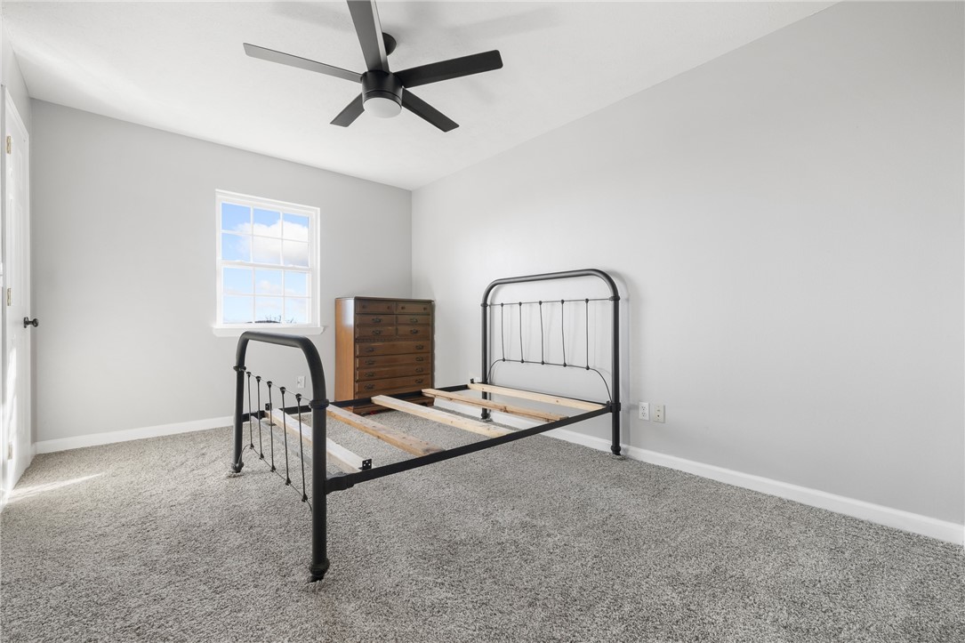 10974 Ricks Drive Harrison, AR 72601 - Photo 27 of 59 Unfurnished bedroom featuring carpet floors and a ceiling fan