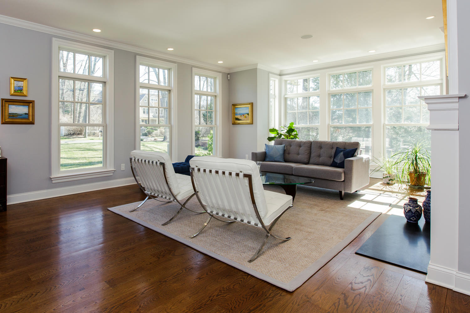 81 Parish Road New Canaan, CT 06840 - Photo 11 of 48 a living room with furniture large window and wooden floor