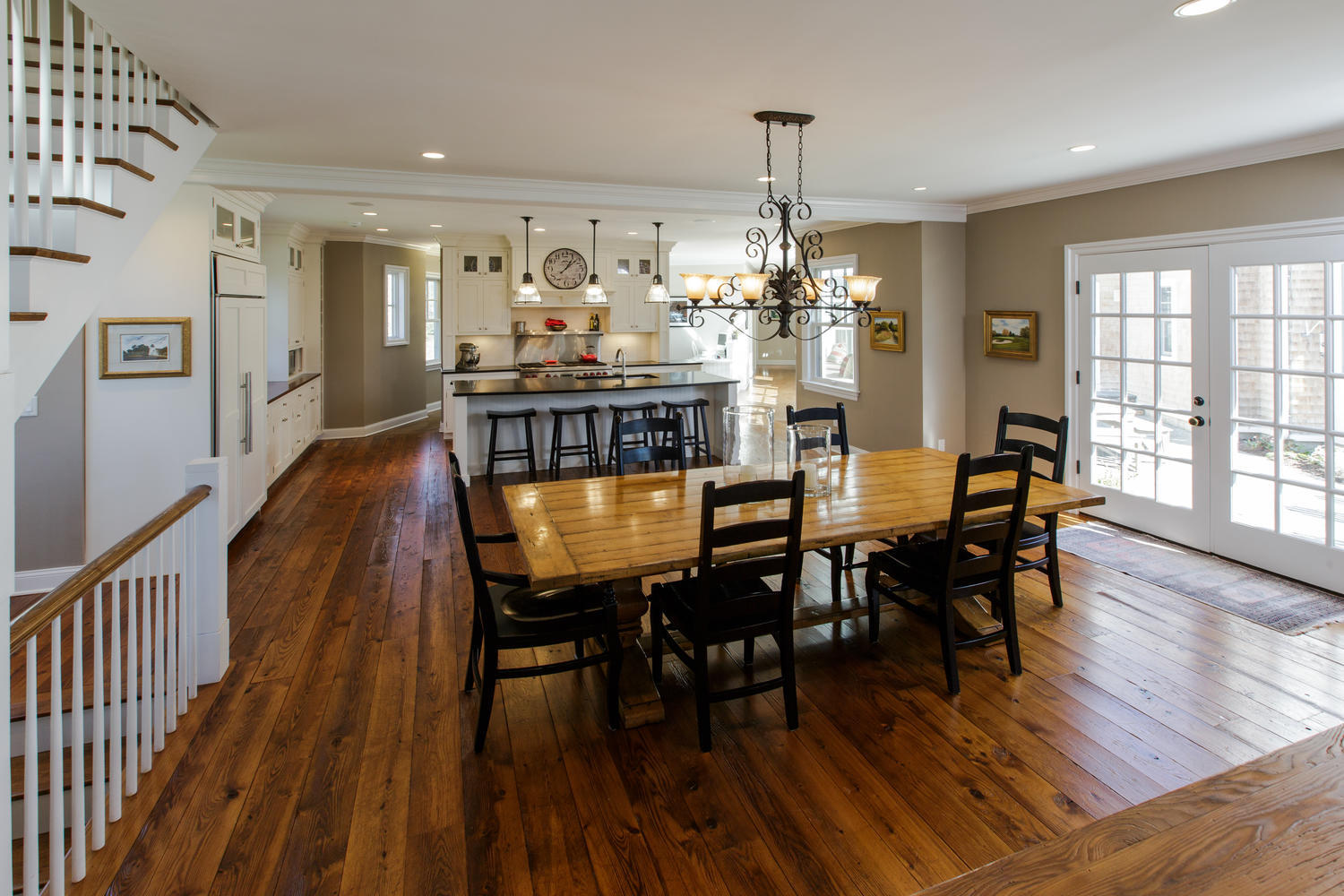 81 Parish Road New Canaan, CT 06840 - Photo 15 of 48 a dining room with furniture a chandelier and wooden floor