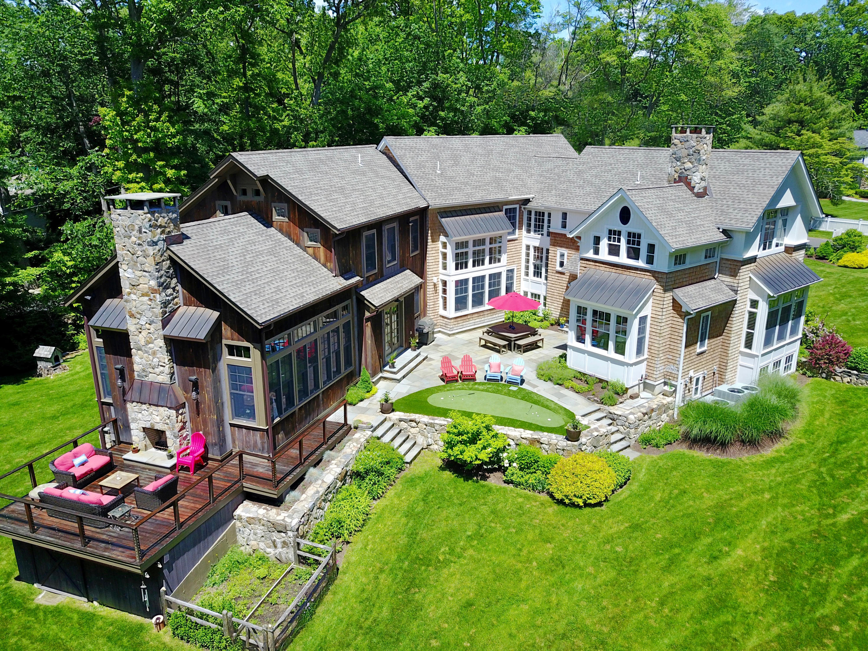 81 Parish Road New Canaan, CT 06840 - Photo 2 of 48 an aerial view of a house with balcony and garden