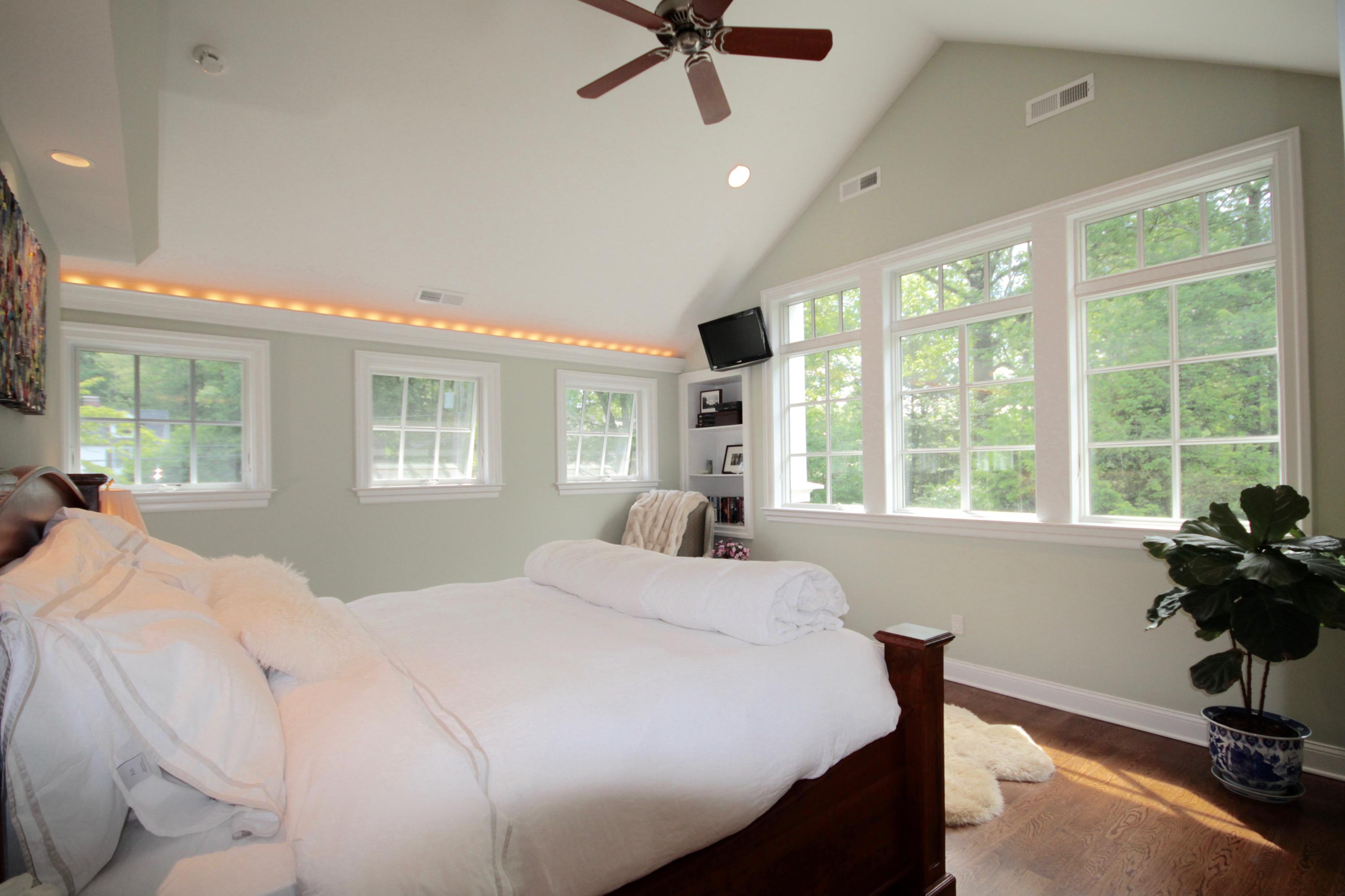 81 Parish Road New Canaan, CT 06840 - Photo 23 of 48 a bedroom with a bed and a table
