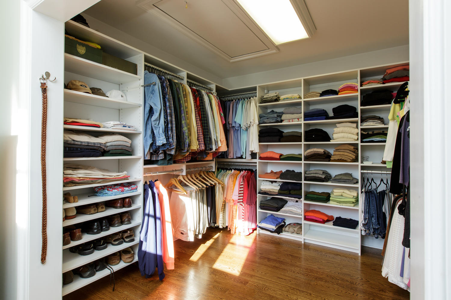 81 Parish Road New Canaan, CT 06840 - Photo 25 of 48 a view of walk in closet with clothes and shoes