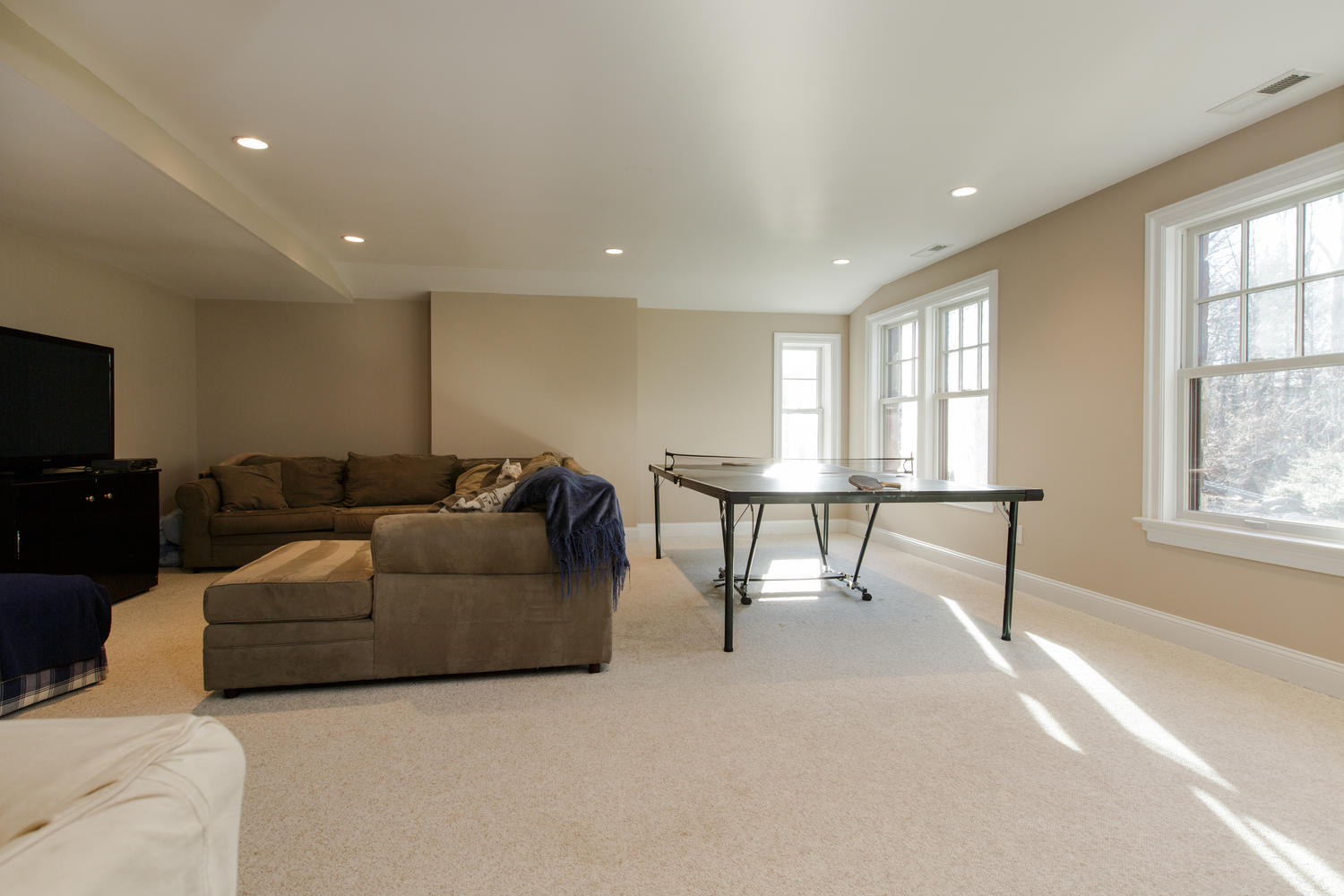 81 Parish Road New Canaan, CT 06840 - Photo 33 of 48 a living room with furniture and a window