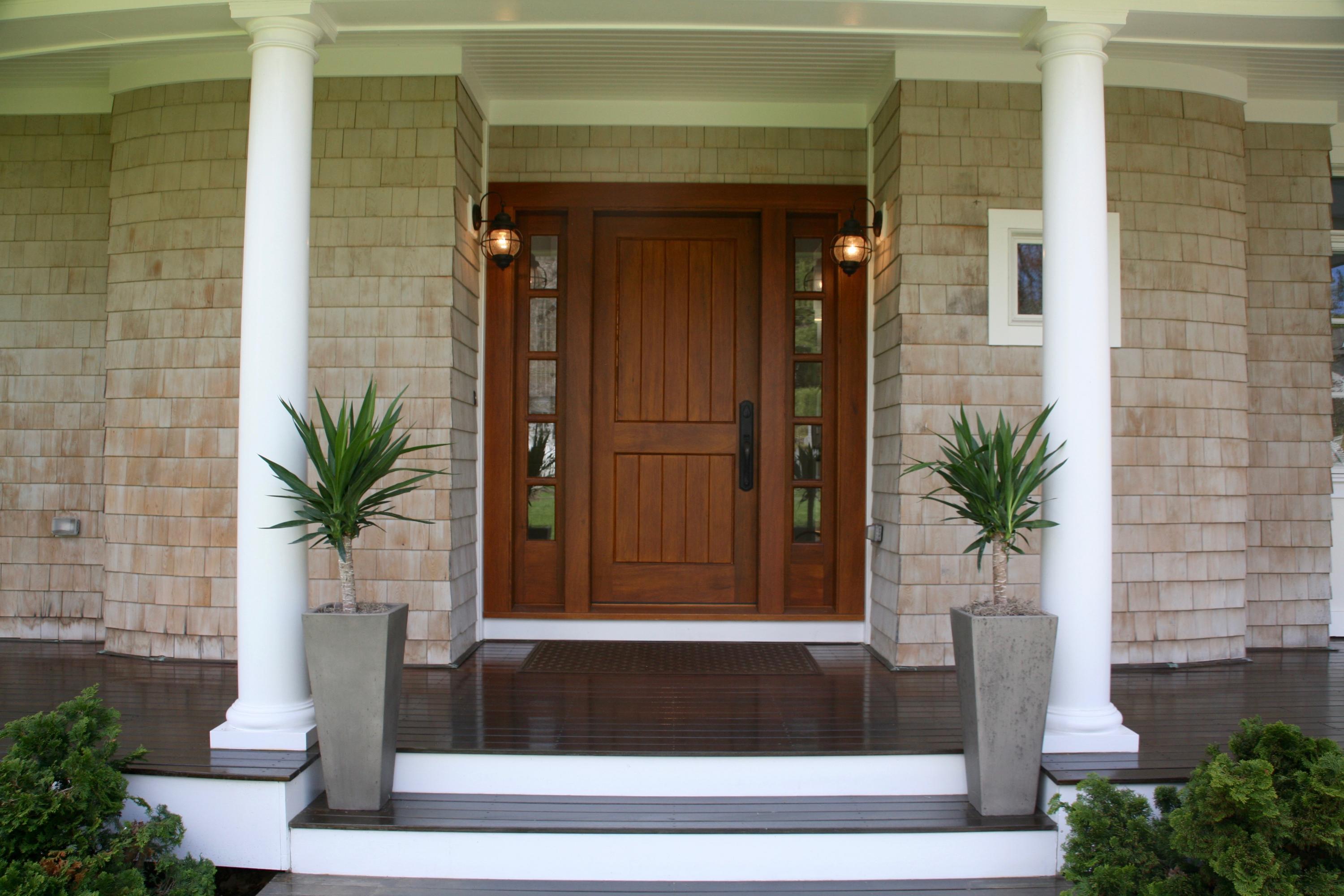 81 Parish Road New Canaan, CT 06840 - Photo 4 of 48 a potted plant sitting in front of a door