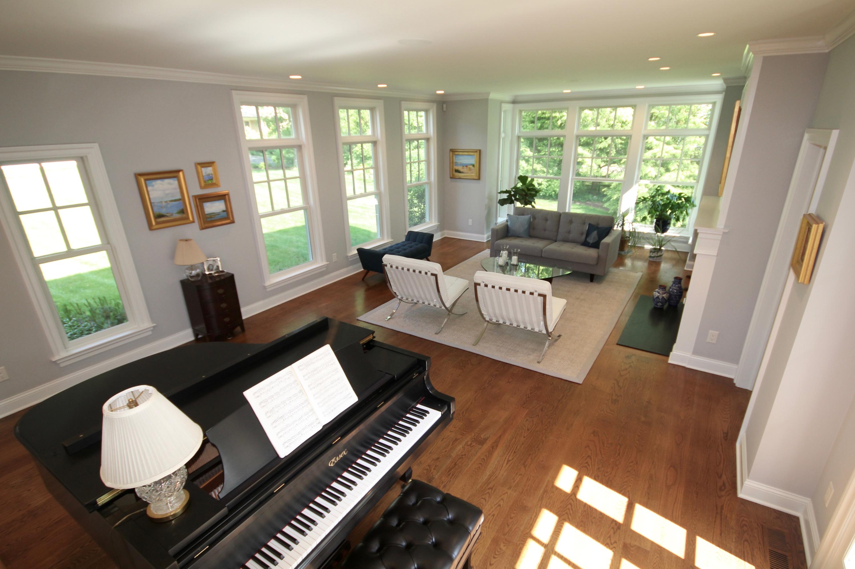 81 Parish Road New Canaan, CT 06840 - Photo 10 of 48 a living room with furniture and a floor to ceiling window