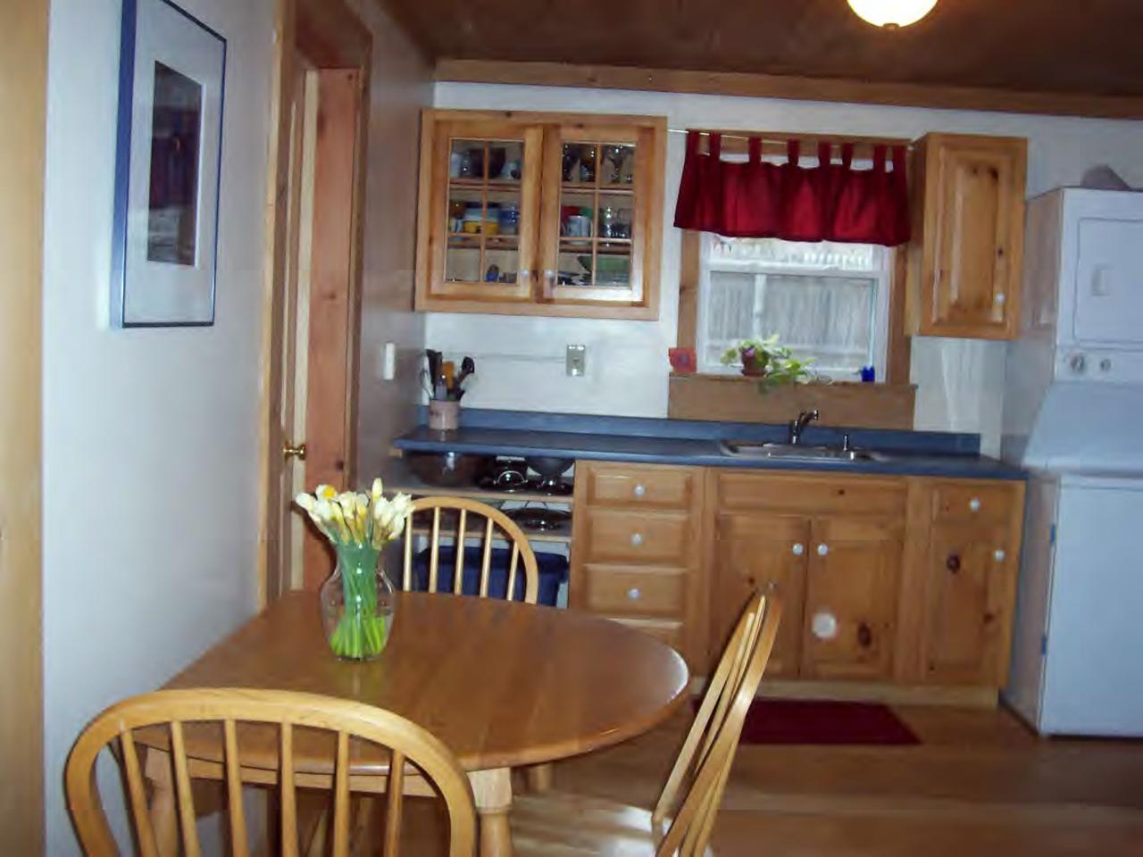 9 Old Route Windsor, MA 01270 - Photo 2 of 6 a view of a dining room with furniture