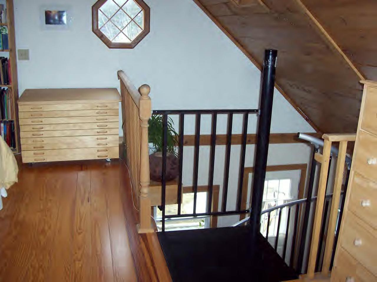 9 Old Route Windsor, MA 01270 - Photo 4 of 6 a view of a hallway with wooden floor and stairs