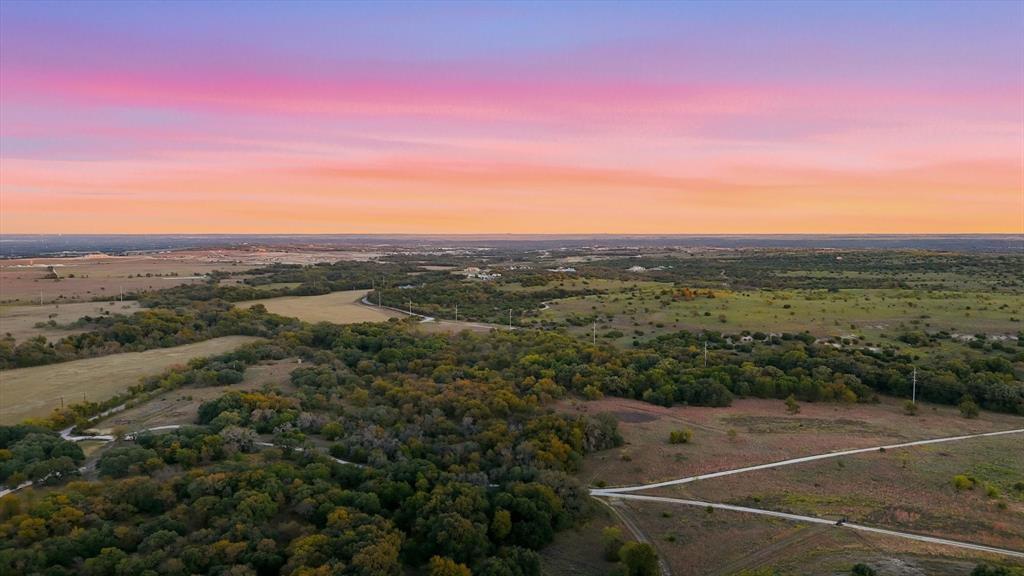 2401 Bear Creek Road Aledo, TX 76008 - Photo 4 of 37 Aerial view at dusk of a view of rural / pastoral area