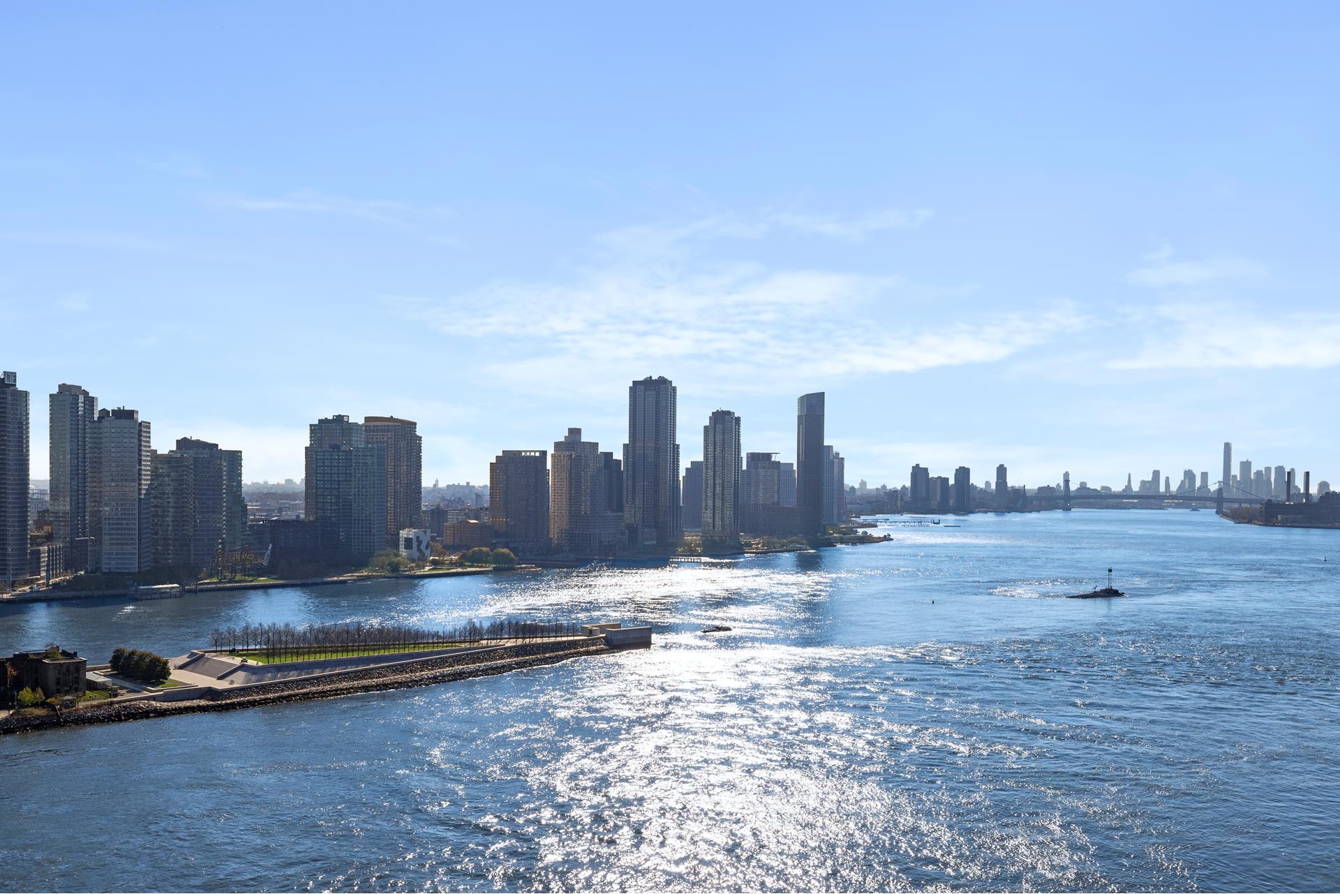 435 East 52nd Street, Unit 15A Manhattan, NY 10022 - Photo 6 of 17 a view of a lake