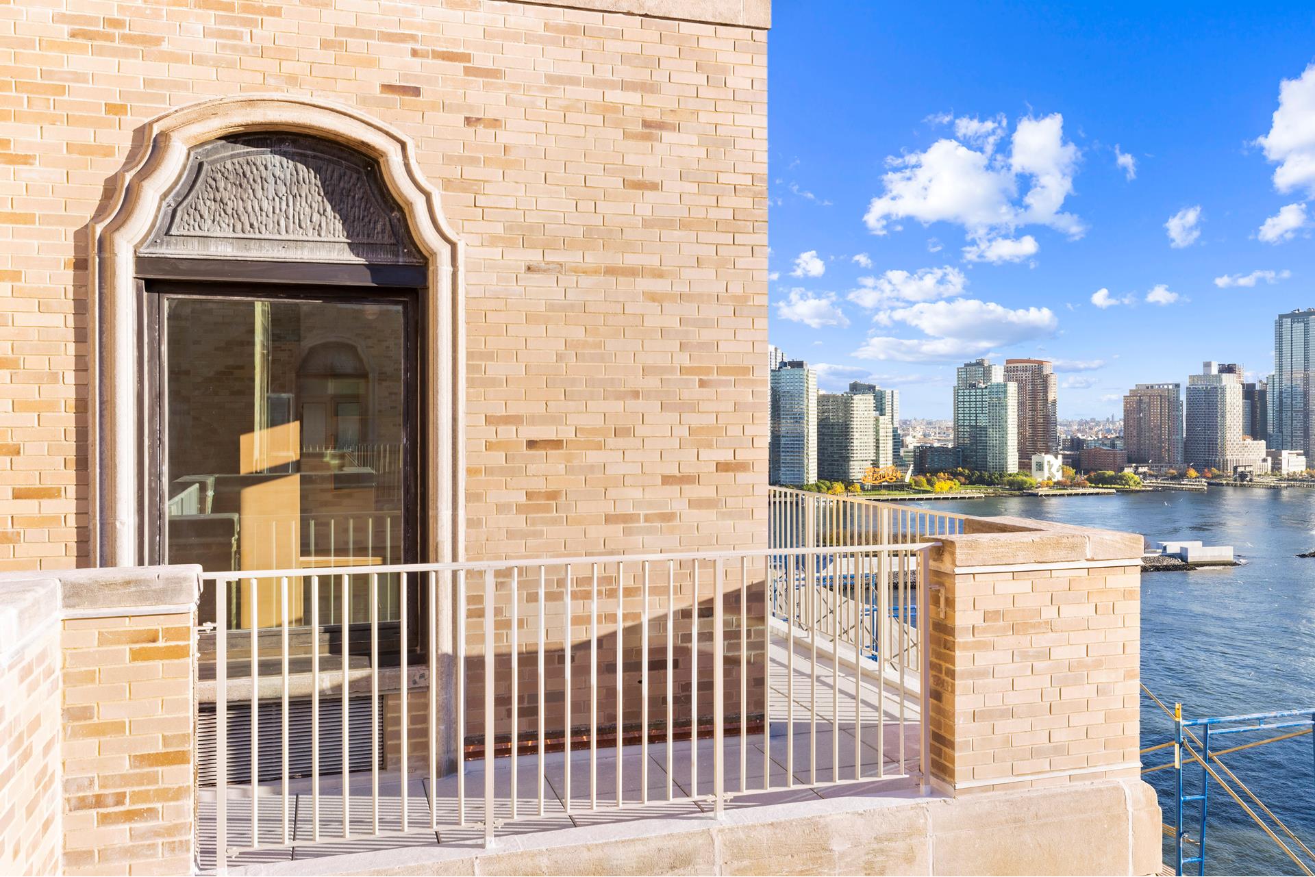 435 East 52nd Street, Unit 15A Manhattan, NY 10022 - Photo 8 of 17 a view of a balcony with a fountain