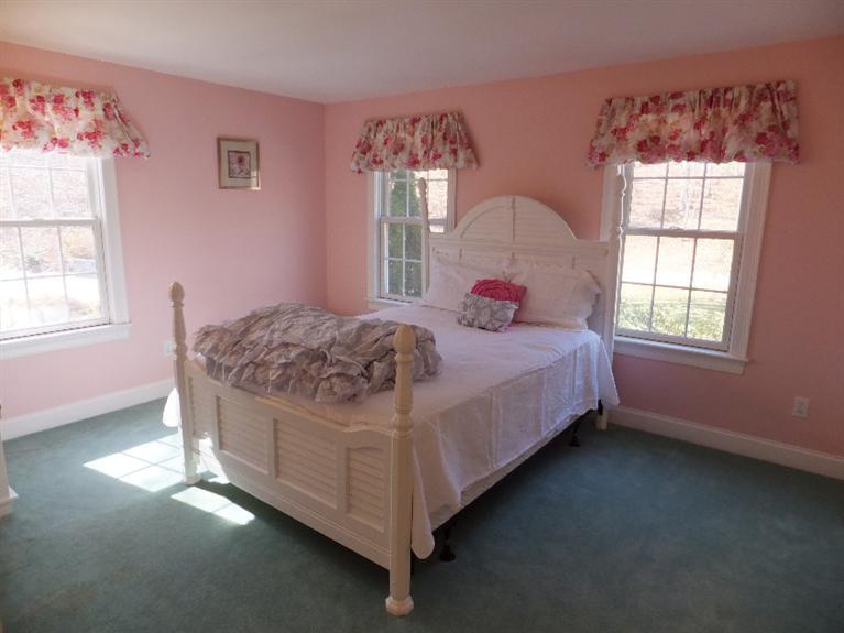 2179 Service Road West Barnstable, MA 02668 - Photo 11 of 26 a bedroom with a bed and window