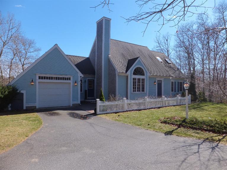 2179 Service Road West Barnstable, MA 02668 - Photo 2 of 26 a front view of a house with a yard