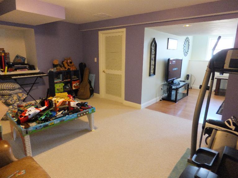 2179 Service Road West Barnstable, MA 02668 - Photo 22 of 26 a bedroom with bed and wooden floor