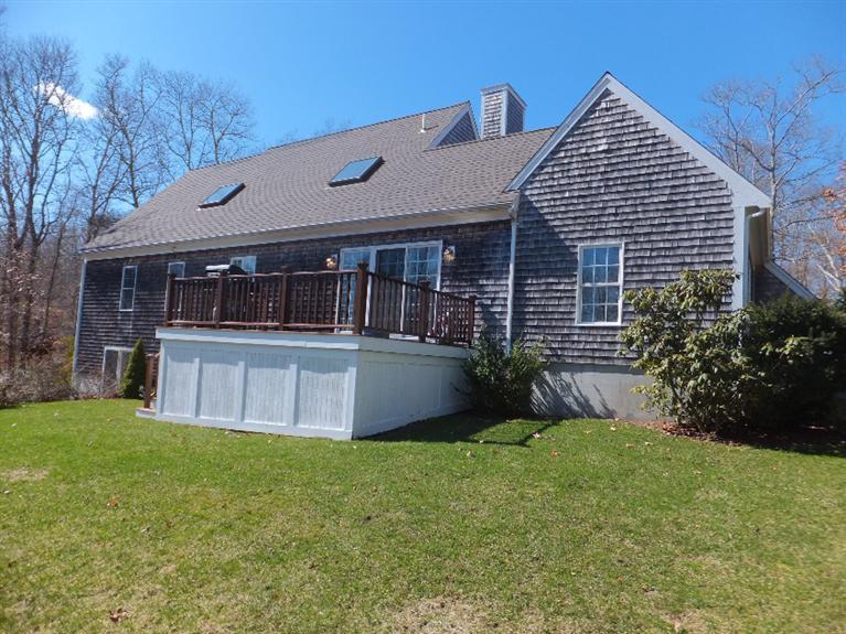 2179 Service Road West Barnstable, MA 02668 - Photo 26 of 26 a front view of house with yard and green space