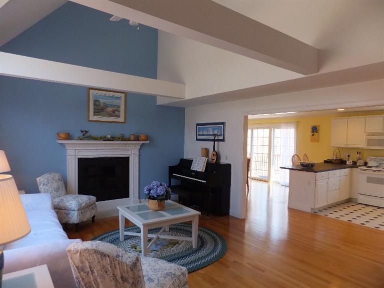 2179 Service Road West Barnstable, MA 02668 - Photo 9 of 26 a living room with furniture fireplace and window