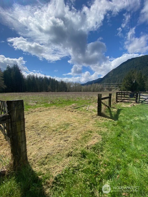 7790 Ranger Station Road Marblemount, WA 98267 - Photo 5 of 9 a view of a lake with a yard