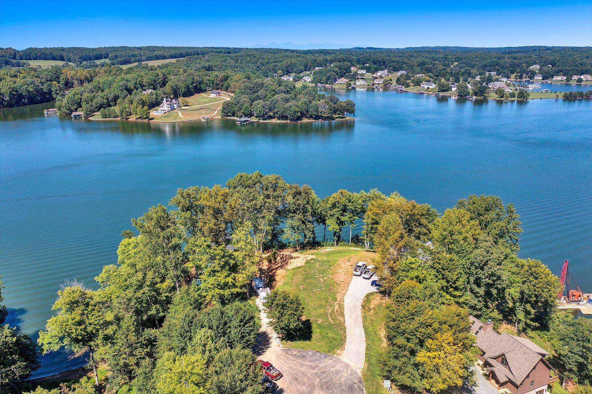 Lot 2 Coves Road Union Hall, VA 24176 - Photo 1 of 12 an aerial view of a houses with a lake view