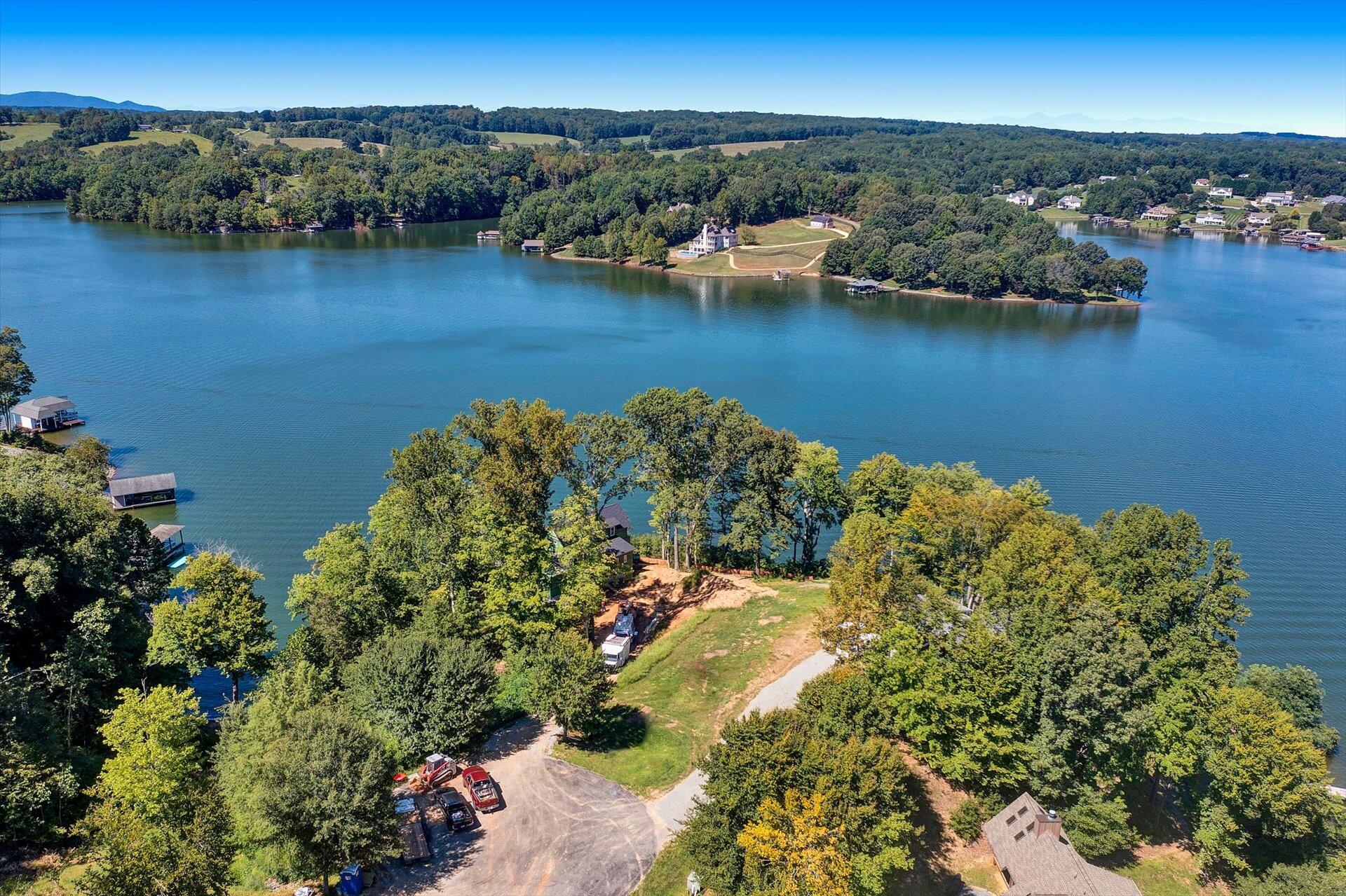Lot 2 Coves Road Union Hall, VA 24176 - Photo 2 of 12 an aerial view of residential houses with outdoor space and lake view