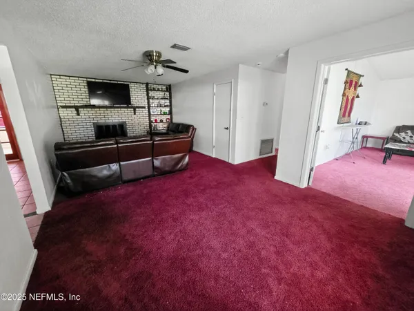 a view of livingroom with furniture