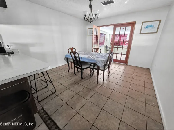 a view of a dining room with furniture