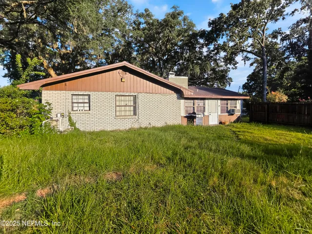 a view of a backyard with a garden