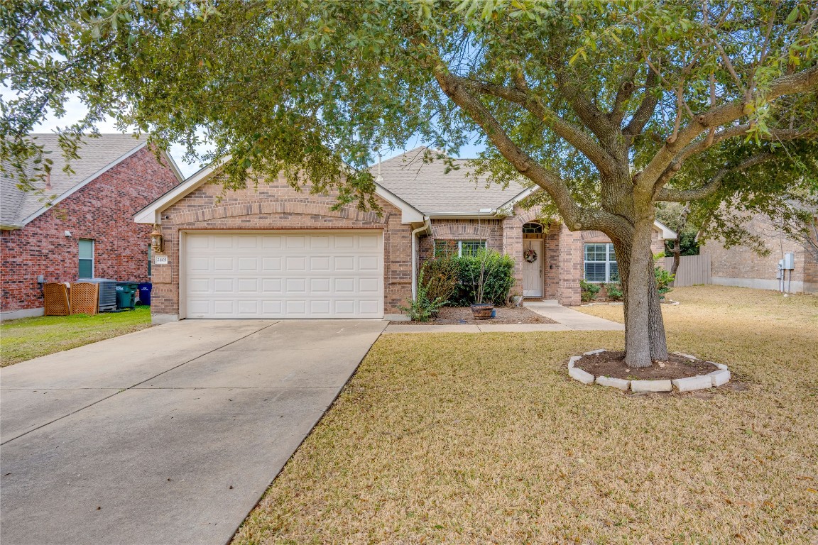 2403 White Stallion Way Leander, TX 78641 - Photo 1 of 1 a front view of a house with a yard