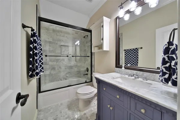 a room with gym equipment and windows