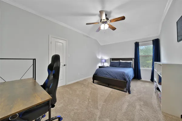 a bathroom with a granite countertop sink a toilet a mirror and shower